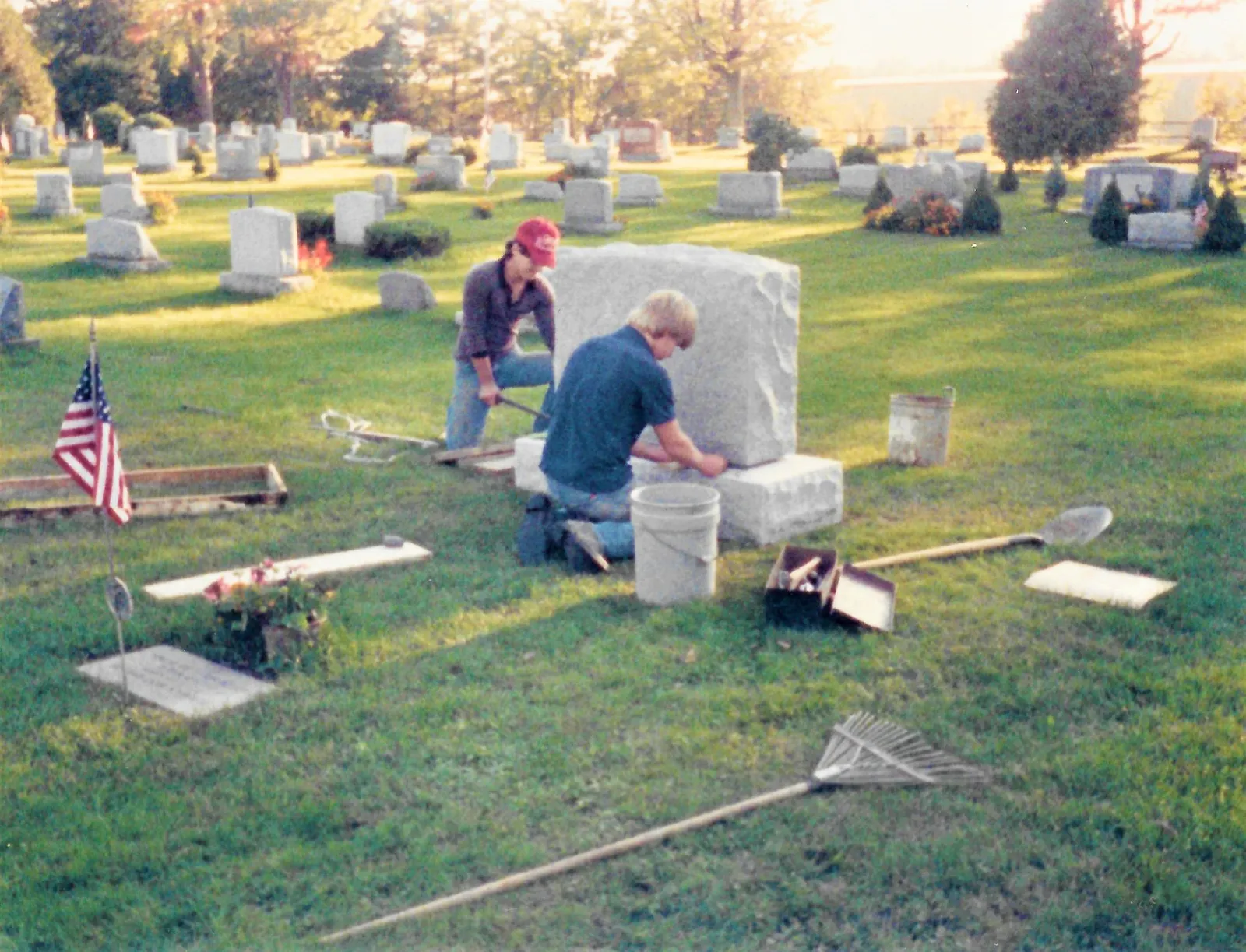A Champlain Monuments crew setting a monument