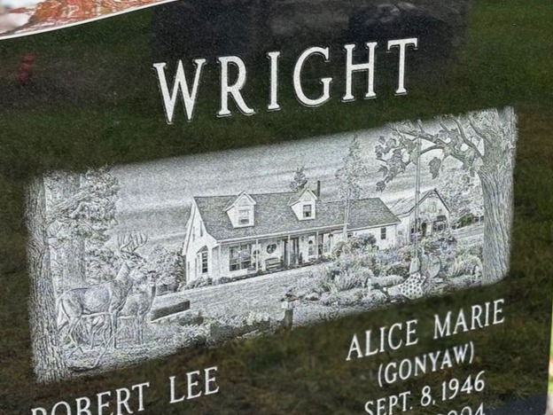 Laser-etched custom house on polished black granite
