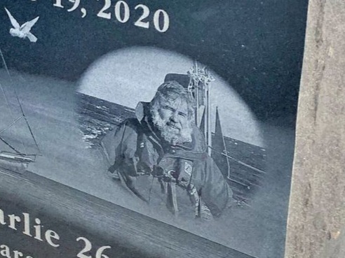 Custom laser-etched portrait on polished black granite