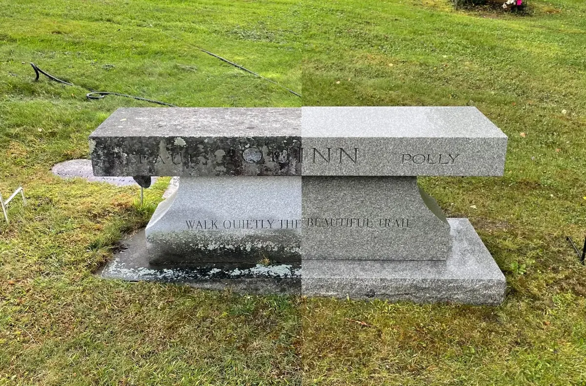 Professional monument cleaning in progress