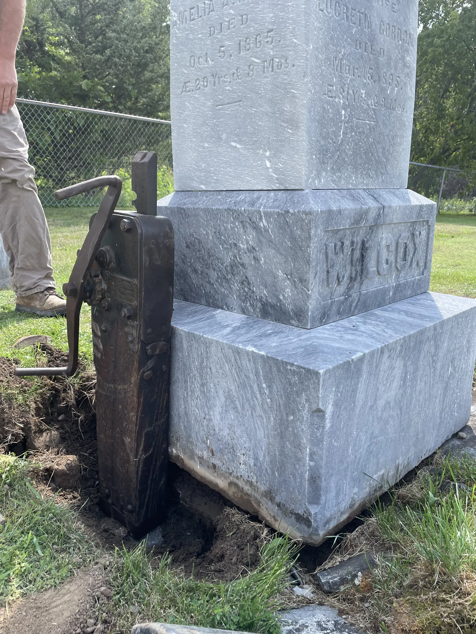A monument being releveled and stabilized
